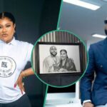 Nollywood actress Nkechi Blessing has stirred reactions by displaying a framed photo of herself and award-winning singer Davido.