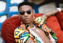 Wizkid's opulent London mansion is showcased in a viral video, offering fans a glimpse into his lavish lifestyle and heartwarming family moments.